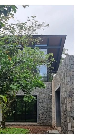 The 'House in a Grove' is an ode to its setting. It is almost impossible to see unless you are within it, a hidden quality we enjoy.