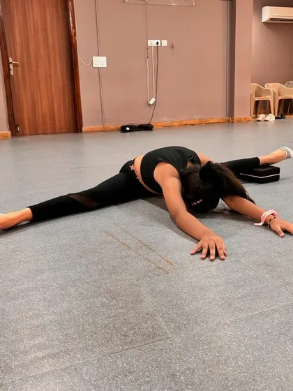 Our students are always growing. These images capture their progress in flexibility and technique, from deep splits to high extensions at the barre, with guidance from our teachers.