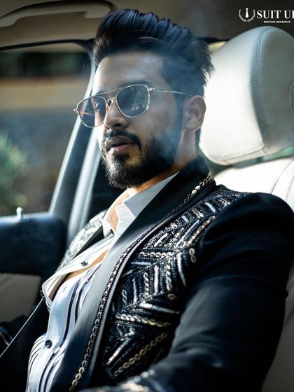 A client looking cool and collected in his heavily embellished tuxedo. The right outfit gives you an undeniable sense of confidence.