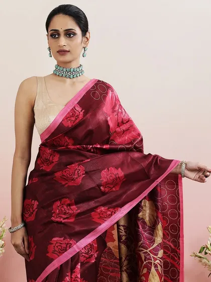 A repeat of the beautiful maroon floral printed saree, a timeless piece from our collection.