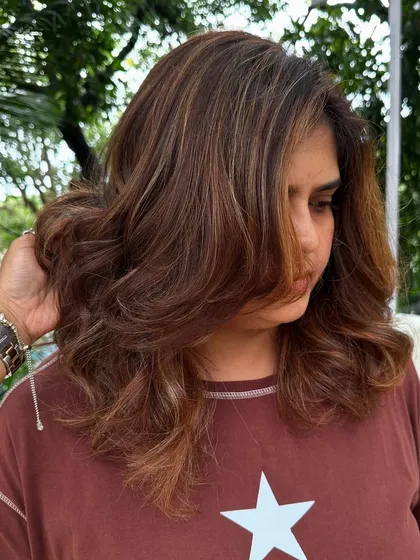 Travel ready. A good hair color and style can make you feel put-together and confident, no matter where you're heading. This warm, multi-tonal look is perfect for any adventure.