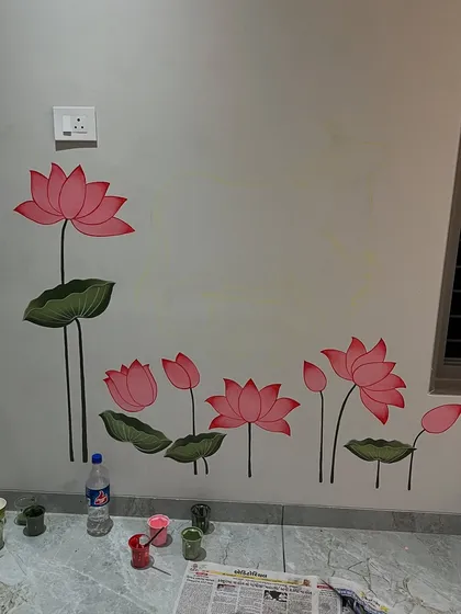 A work in progress view of the lotus flowers for the pooja room mural. I paint each petal and leaf to create a sense of calm and purity, framing the sacred space with natural beauty.