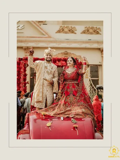 The groom's grand entry. Our client looks regal in a classic beige sherwani with subtle gold embroidery, making a memorable arrival on his wedding day.