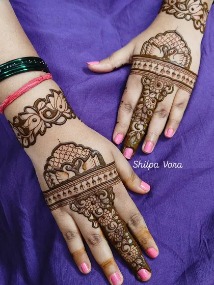 Simple yet elegant peacock and lotus cuff designs, perfect for someone who wants a minimal but traditional look.