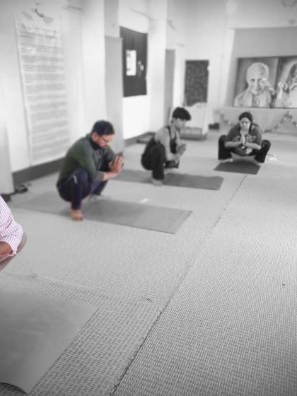 Students practicing Malasana (Garland Squat) during our Bodhichitta Retreat. This pose is excellent for grounding and opening the hips, especially after a day of travel or hiking.