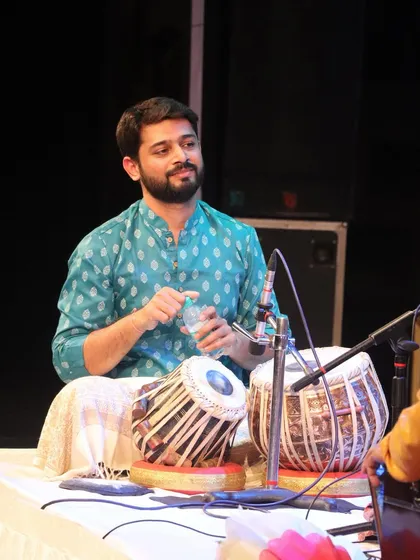 Another candid from the stage, preparing the powder for my hands before playing.