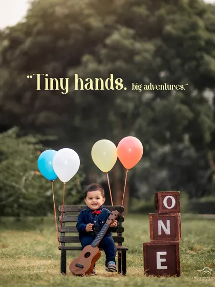 This little musician is ready to celebrate his first birthday with balloons and a ukulele. Our outdoor sessions allow for creative and playful portraits.