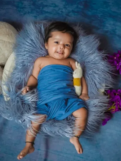 Proof that angels do nap on clouds. This newborn photography session captures the serene beauty of your sleeping baby.