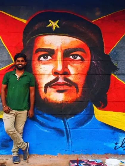 I love creating bold, impactful portraits. This large-scale mural of Che Guevara was painted on a compound wall, transforming a simple surface into a powerful statement piece with vibrant colors and strong details.