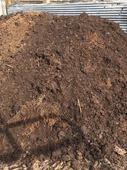 A pile of finished, aged compost ready for sale. While we work on the sifter, we sometimes sell unsifted compost, which is still a great product but at a lower price.