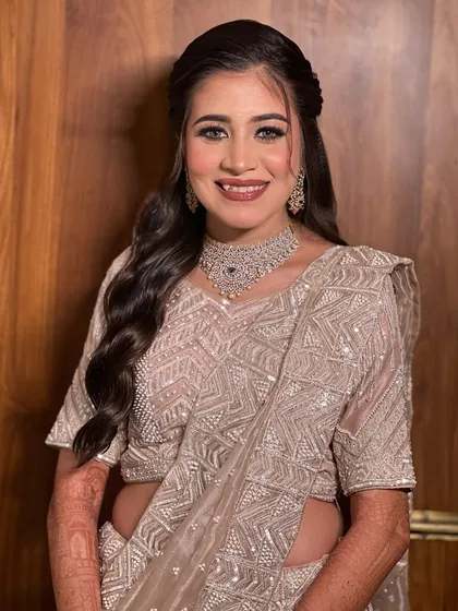 A chic and modern reception look with soft waves and a beautiful diamond choker.