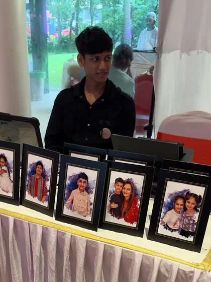 My compact digital caricature setup at a birthday party. All I need is a small table for my tablet and printer to create memorable party favors for your guests.