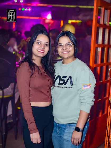 Guests posing for a photo at Shift HSR. It's a great place to hang out with friends.