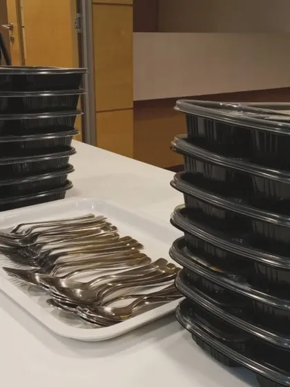 Stacks of our packed meal containers ready for a large catering order. We ensure every meal is packed hygienically and is easy to transport and serve.