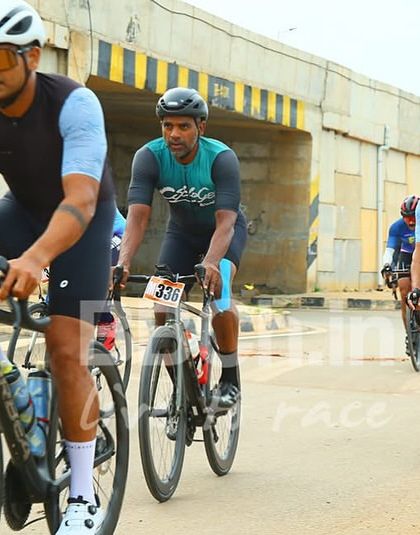 Masters category riders navigate an underpass. The varied terrain of our courses keeps the racing dynamic and unpredictable.
