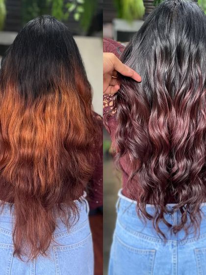 A bold wine-red balayage transformation. We corrected a previous orange-toned color to create this rich, deep red look that is both vibrant and sophisticated.
