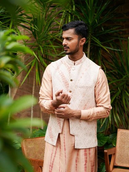 A soft, pastel-toned ethnic look featuring a printed Nehru jacket. This demonstrates my versatility in modeling for different seasonal collections.