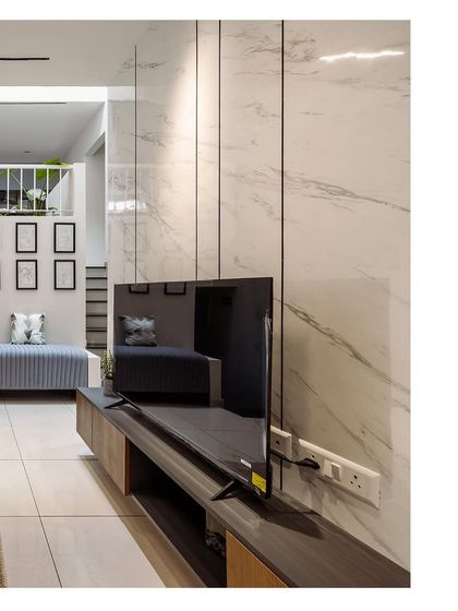 A duplicate of the entertainment unit shot, providing a clear and detailed view of the living room's design features.