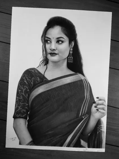 A completed portrait of a woman in a traditional saree. I take extra care to render the fabric patterns and jewelry with precision.