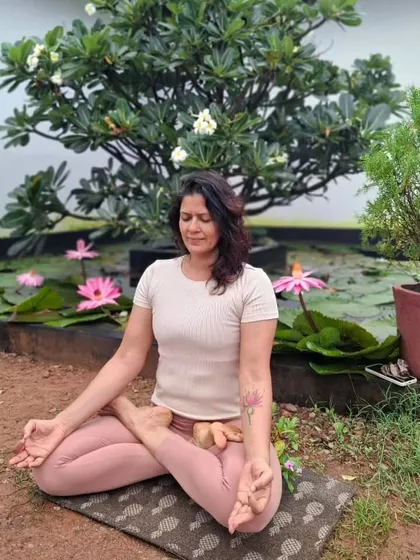 Channeling my inner garden gnome with a Padmasana in this beautiful zen garden. A little bit of yoga humor to brighten the day.