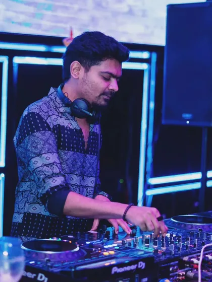 Mixing tracks during the Diwali fashion event. The setup allowed me to be right in the middle of the action, feeling the energy from the runway.