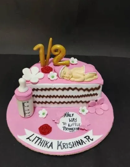 Celebrating the halfway mark to a first birthday! This "half cake" is a fun and popular way to celebrate your little princess turning six months old.