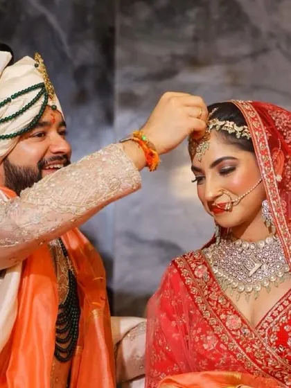 The sindoor moment for my beautiful bride Nitya. The groom's happy smile makes it even more special.