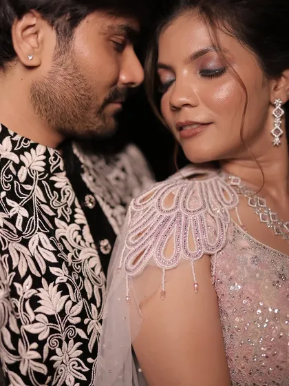 An intimate couple portrait from the sangeet night.