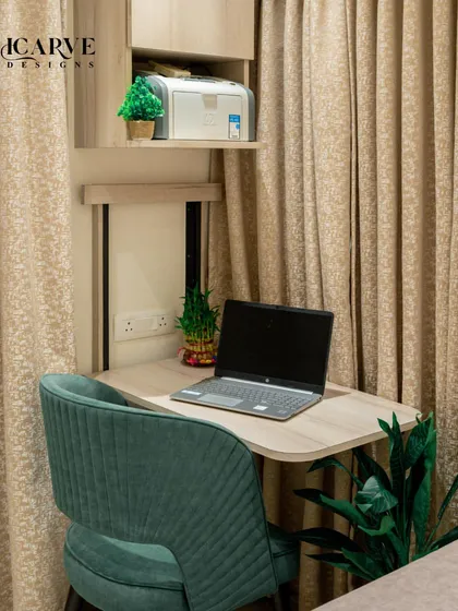 A close-up of the custom-designed study nook. We ensure even the smallest corners are utilized effectively, with dedicated shelving for a printer and other essentials, making work-from-home a breeze.