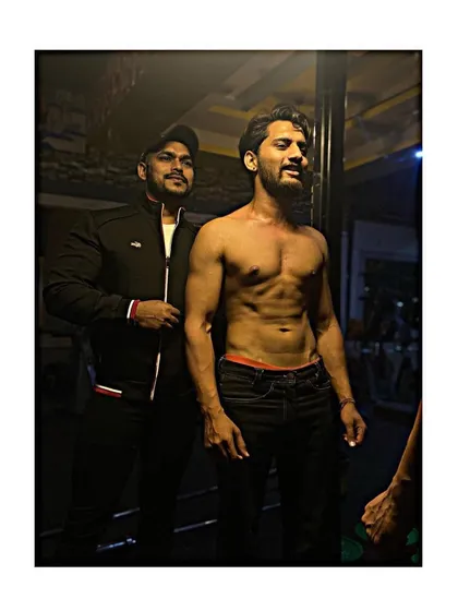 With a client after a tough session. You can see the definition and conditioning that comes from consistent hard work.