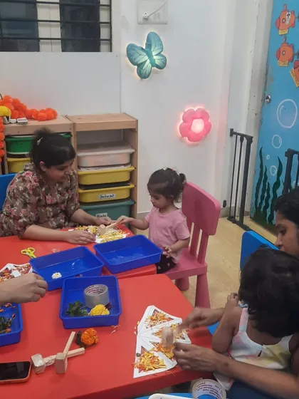 A candid shot from our Diwali workshop, showing parents and kids working together on crafts. These are the moments that build lasting memories.