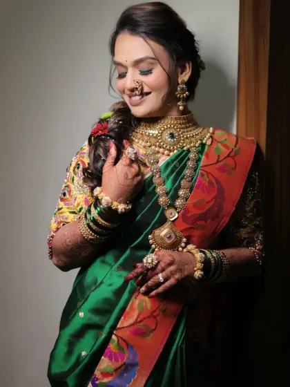 The final result is always about the bride's happiness. Here is one of my beautiful clients, her traditional Paithani saree look perfectly complemented by the intricate bridal mehendi I designed for her.