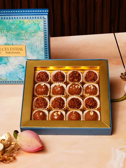 Our handcrafted chocolate truffles are a timeless indulgence. This assorted box, styled for Rakhi, shows how we blend fine couverture chocolate with classic flavors, creating a perfect alternative to traditional mithai for any festival.