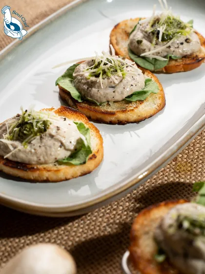 Simple, earthy, and unforgettable. This creamy mushroom pate on toasted mini flatbreads is a sophisticated appetizer that highlights the quality of the ingredients. It's a perfect addition to a grazing table or as a passed canapé.