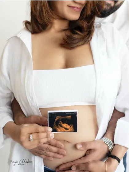 The very first hello. Incorporating your sonogram picture is a simple yet incredibly powerful way to tell the story of your growing family and the love that's already so strong.