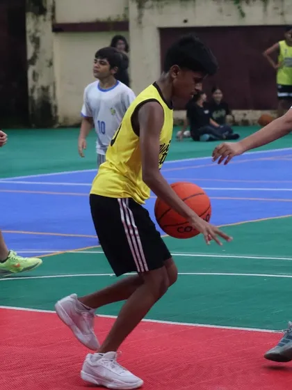 A player works on his crossover dribble against a defender. Drills like this are key to developing game-changing offensive moves.