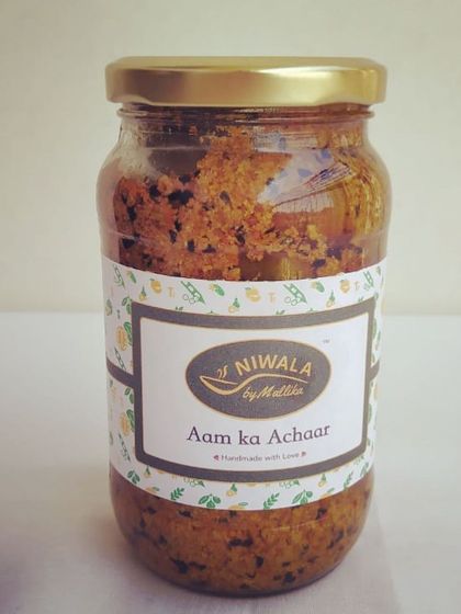 A jar of my signature Aam ka Achaar, the pickle that holds a special place in my heart. It’s a taste of my childhood and the first recipe I perfected. This traditional mango pickle is a staple for any Indian meal.