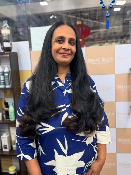 For those who love their long hair, we provide cuts that add shape and style without sacrificing length. This long layered cut is finished with beautiful curls at the ends.