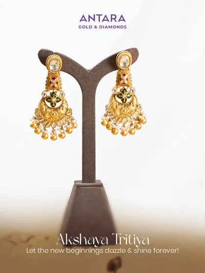 A blessing adorned, a promise preserved. These traditional earrings with meenakari and polki work are designed to let every new beginning dazzle and shine forever this Akshaya Tritiya.