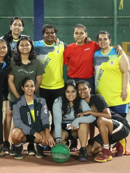 Another shot of our women players, showcasing the friendships formed through basketball.