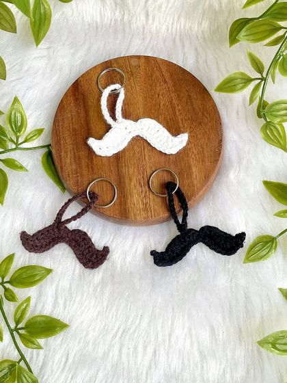 These mustache keychains are a fun and quirky accessory, available in different colors.