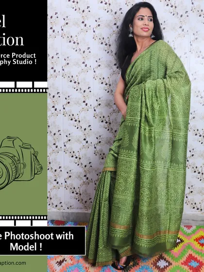 A full-length shot of a model gracefully wearing a green printed saree. This classic pose effectively displays the entire length and drape of the saree.