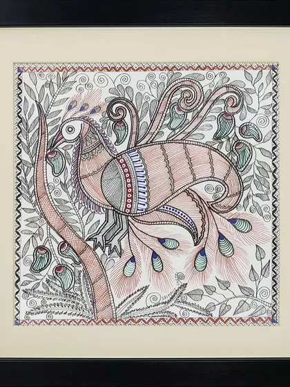 This Madhubani painting by Pramod features a stylized bird with a long, flowing tail amidst foliage. The delicate line work and earthy color palette give this piece a subtle and elegant feel.