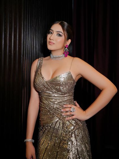 Posing with confidence, my client showcases her full cocktail look. The makeup is designed to look stunning from every angle and last all night through dinner and dancing.