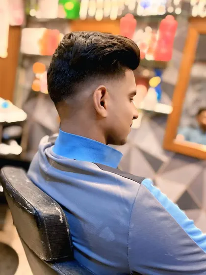 The back and side view of the high fade, showing the seamless blend and sharp lines that define this popular men's haircut.