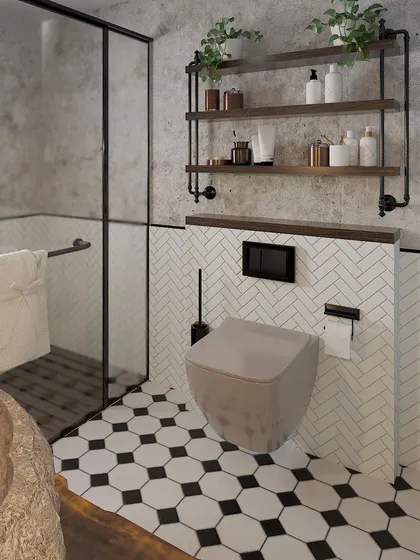 The WC area in the earthy bathroom, with white herringbone wall tiles and open wooden shelves for storage.