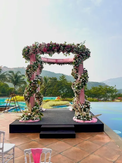 A view of the poolside mandap from the guest seating area, showing how we create a picture-perfect frame for the wedding ceremony.