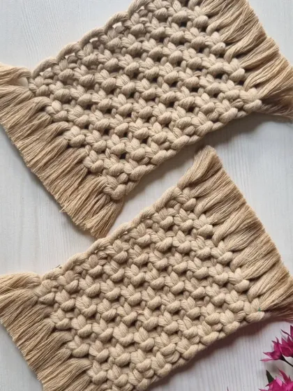 This pair of beige rectangular coasters offers a neutral, calming aesthetic that fits with any decor.