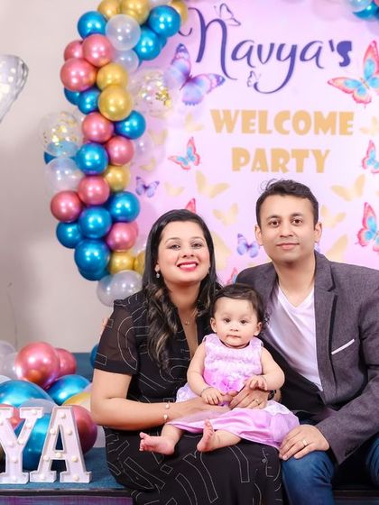 A charming 'Baby Shark' themed birthday party, featuring a vibrant underwater backdrop, character cutouts of the shark family, and blue and yellow balloons, perfect for a fun-filled celebration.