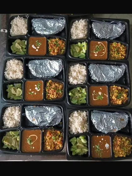 Another view of a bulk thali order. This included my popular Dal Makhni and Paneer Bhurji combination, a favorite for many parties.